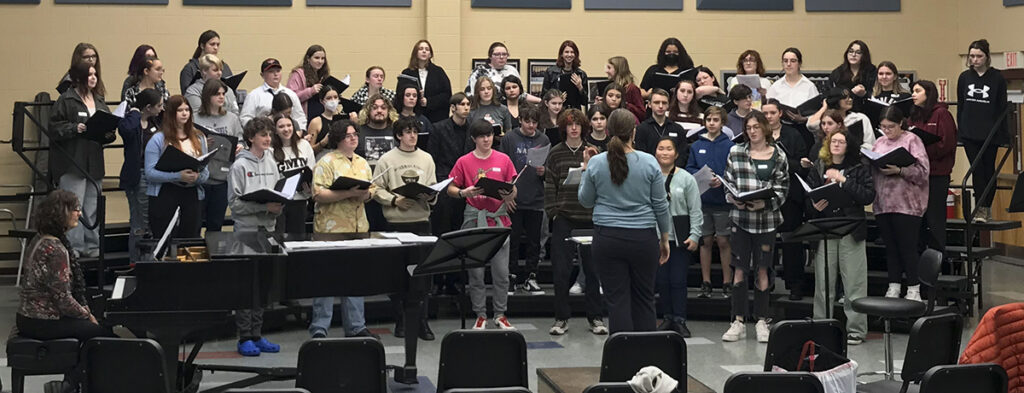 Featured image of article: ConVal Chorus Members Rehearse With MVMF Chorus